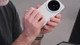 Grip connected to the phone