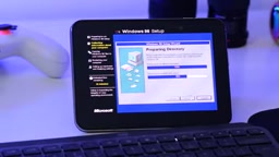 iPhone Duo Transformed into a Windows 98 Gaming PC: Hands-On Test and Experience
